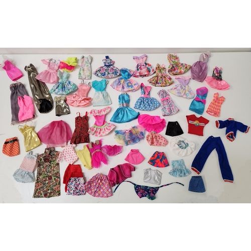 306 - SELECTION OF ELEVEN MATTEL AND OTHER DOLLS  AND A LARGE SELECTION OF BARBIE CLOTHING AND ACCESSORIES... 