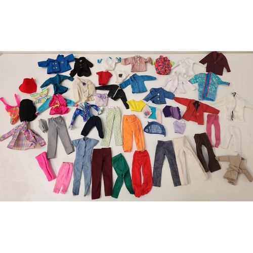 306 - SELECTION OF ELEVEN MATTEL AND OTHER DOLLS  AND A LARGE SELECTION OF BARBIE CLOTHING AND ACCESSORIES... 