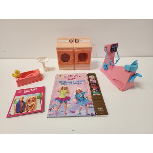 309 - LARGE SELECTION OF BARBIE FURNITURE AND HOUSEHOLD ACCESSORIES
including a battery operated washer/dr... 