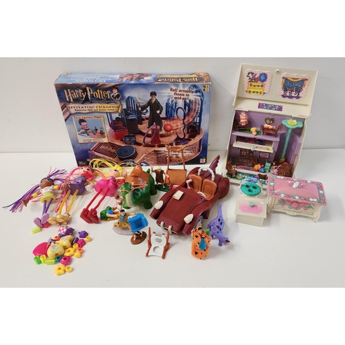 SELECTION OF TOYS
comprising Tonka fairies and accessories, Betty Spaghetti dolls, Flintstones car and figures, and a boxed Harry Potter Levitating Challenge Electronic Skill and Action Game