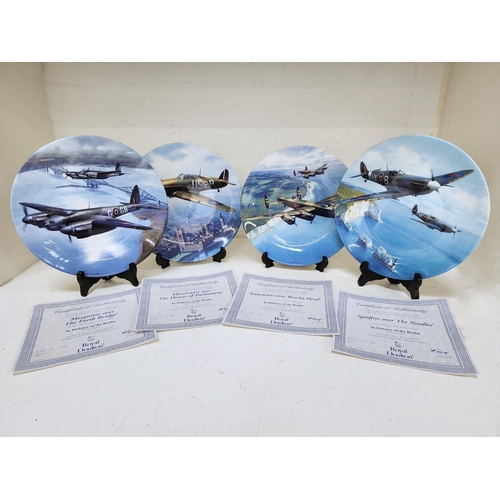 FOUR ROYAL DOULTON COLLECTOR'S PLATES
from the series entitled 'In Defence of the Realm', comprising 'Lancasters over Beachy Head', 'Mosquitos over the Forth Bridge', Spitfires over the Needles' and Hurricanes over the Houses of Parliament', all with certificates