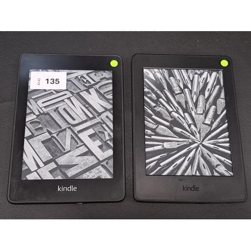 TWO AMAZON KINDLE PAPERWHITE E-READERS 
comprising a paperwhite 3, serial number G090G105603400BM; and a paperwhite 4, serial number G000 T614 1085 0CLU (2)
Note: It is the buyer's responsibility to make all necessary checks prior to bidding to establish if the device is blacklisted/ blocked/ reported lost. Any checks made by Mulberry Bank Auctions will be detailed in the description. Please Note - No refunds will be given if a unit is sold and is subsequently discovered to be blacklisted or blocked etc.