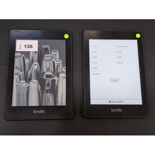 136 - TWO AMAZON KINDLE PAPERWHITE E-READERS 
comprising a paperwhite 4, serial number G000 PP07 8372 070Q... 