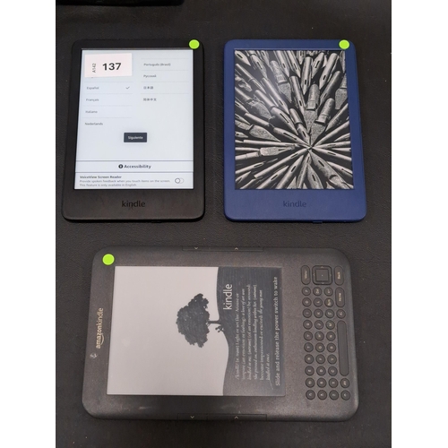 THREE AMAZON KINDLE E-READERS 
comprising a Basic 4 in Blue, serial number G092 AQ05 3413 075G; a Basic 4, serial number GOG2 AP03 3132 01G0; and a Kindle 3 Wi-Fi, serial number B008 A0A0 0387 52CB (3)
Note: It is the buyer's responsibility to make all necessary checks prior to bidding to establish if the device is blacklisted/ blocked/ reported lost. Any checks made by Mulberry Bank Auctions will be detailed in the description. Please Note - No refunds will be given if a unit is sold and is subsequently discovered to be blacklisted or blocked etc.