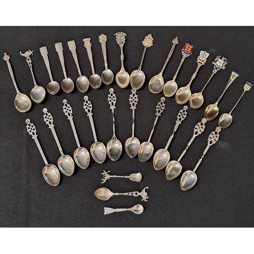 TWENTY EIGHT SILVER NOVELTY TEA SPOONS
with British and continental examples, 272g/9.59oz