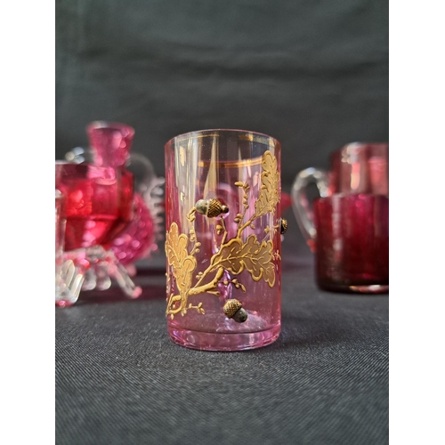 192 - SELECTION OF CRANBERRY AND RUBY GLASS
comprising a pair of salts, small jug, frill rim squat vase, i... 