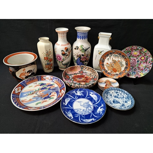 SELECTION OF EAST ASIAN WARES
comprising a vase decorated with bullfinch, Chinese vase decorated with a pheasant, tapering octagonal vase decorated with floral sprays and birds, Chinese vase decorated with birds and flowers, black and coral planter, two Imari style chargers, flower head decorated dish, Chinese floral decorated plate blue and white heron decorated dish, Japanese decorated plate, blue and white decorated bowl and three Japanese small plates