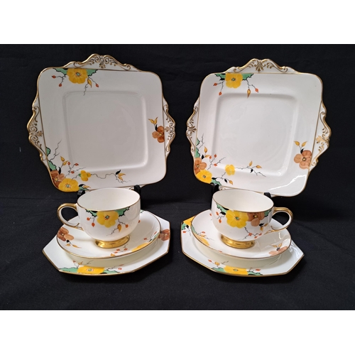 PARAGON TEA SET
the white ground decorated with flowers and gilt highlights, comprising five cups, seven saucers, seven side plates, cake and sandwich plate (21)
