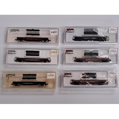 SIX BOXED ATLAS N-GAUGE FLAT CARS
comprising 38141 - Cushioned Loan Union Pacific; 3804 - Canadian Pacific; 38121 - WAB 199 Wabash (pin missing from wheel); 3813 - Western Maryland; 38112 - Southern; and 3806 SL-SF 2012 (6)