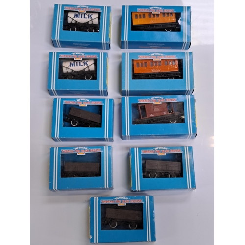 SELECTION OF HORNBY THOMAS THE TANK ENGINE SERIES
comprising 'Annie' coach, R110; 'Clarabel' coach, R112; Brake Van, R109; 2x 'Tidmouth' Milk Tank Wagons, R105; and 4x Open Wagons, R107. All in boxes