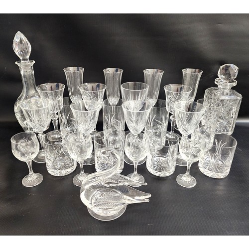 LARGE SELECTION OF CRYSTAL GLASSWARE
comprising six whisky tumblers, nine champagne flutes, ten wines, five brandy balloons, six sherry, four tumblers, two decanters and stoppers and a glass swan ornament