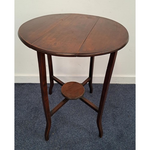 441 - EDWARDIAN MAHOGANY OCCASIONAL TABLE
with shaped drop flaps and fold out shaped supports united by an... 