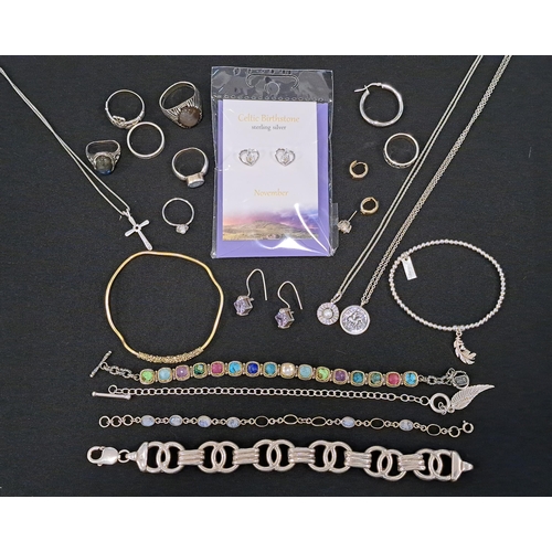 GOOD SELECTION OF SILVER JEWELLERY
including a faceted glass set bracelet, a heavy link bracelet (approximately 30 grams), a ChloBo bracelet with feather charm, other bracelets, earrings, and six rings including a Claddagh ring and a labradorite set example