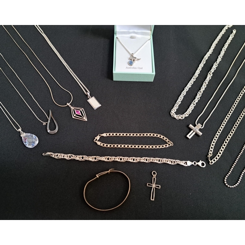 11 - SELECTION OF SILVER JEWELLERY
including an opal set kangaroo pendant on chain, a pink topaz set pend... 