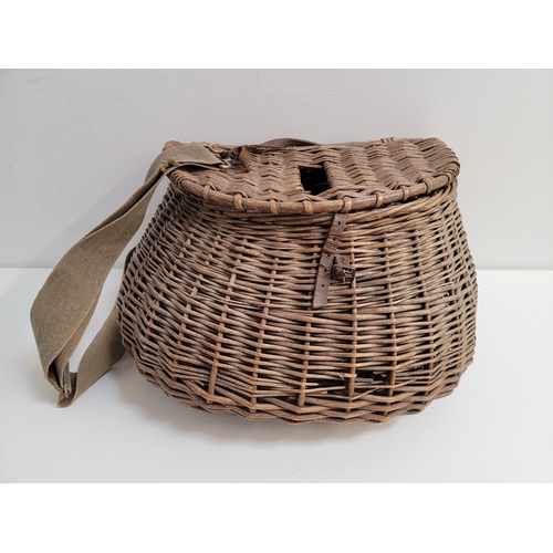 VINTAGE WICKER FISHING CREEL
with lift up lid, leather fastening and canvas and leather shoulder strap, 37cm wide