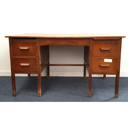 1940s OAK KNEEHOLE DESK
with two pairs of drawers, standing on plain supports, 76cm x 137cm x 76cm