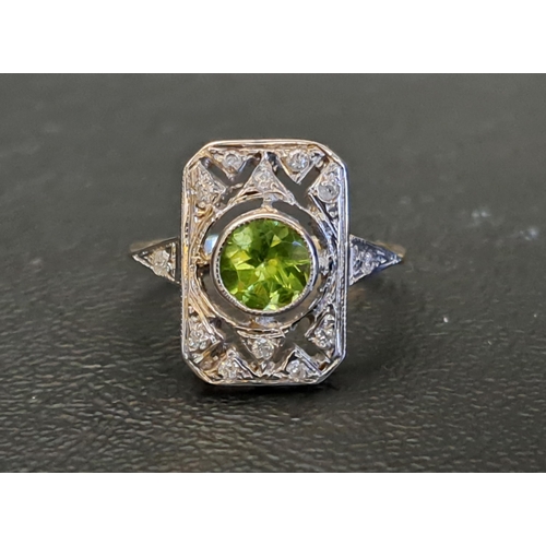 ART DECO STYLE PERIDOT AND DIAMOND PLAQUE RING
the central round cut peridot approximately 1ct in rectangular diamond set pierced setting, on nine carat gold shank, ring size O-P