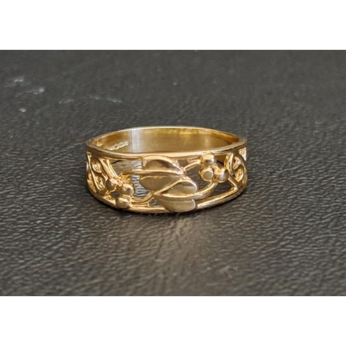 NINE CARAT GOLD RING
with pierced floral and scroll decoration, ring size L and approximately 1.9 grams
