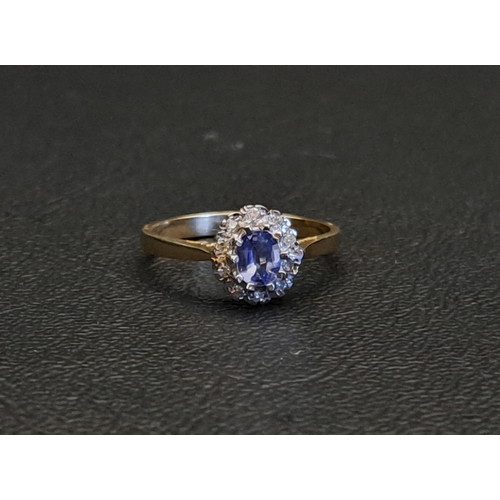 145 - BLUE SAPPHIRE AND DIAMOND CLUSTER RING
the central oval cut sapphire approximately 0.3cts in ten dia... 