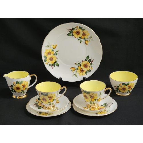 OLD ROYAL BONE CHINA TEA SET
decorated with yellow wild roses and gilt highlights, comprising six cups and saucers, six side plates, sandwich plate, sugar bowl and milk jug (21)