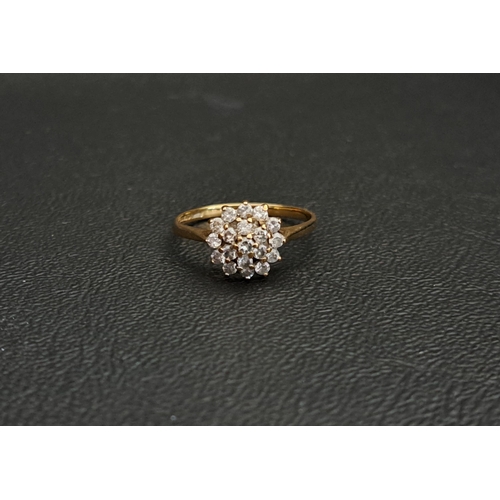 5 - DIAMOND CLUSTER RING
the diamonds in stepped setting totalling approximately 0.6cts, ring size L and... 