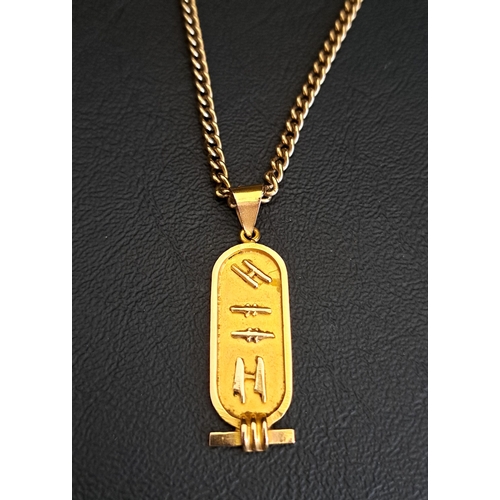 EGYPTIAN EIGHTEEN CARAT GOLD PENDANT
decorated with hieroglyphs, 4.2cm high and approximately 3.6 grams; together with a nine carat gold chain, 46cm long and approximately 12.5 grams