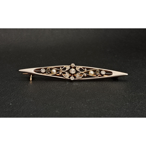 EDWARDIAN DIAMOND AND SEED PEARL BROOCH
of pierced navette form, the diamonds totalling approximately 0.25cts, in unmarked gold (tests as fifteen carat), 5.6cm wide and approximately 4.6 grams