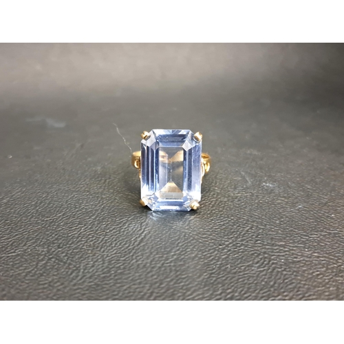 BLUE TOPAZ DRESS RING
the rectangular step cut topaz measuring approximately 17.8mm x 13mm x 7.2mm, on nine carat gold shank, ring size R and approximately 6.7 grams