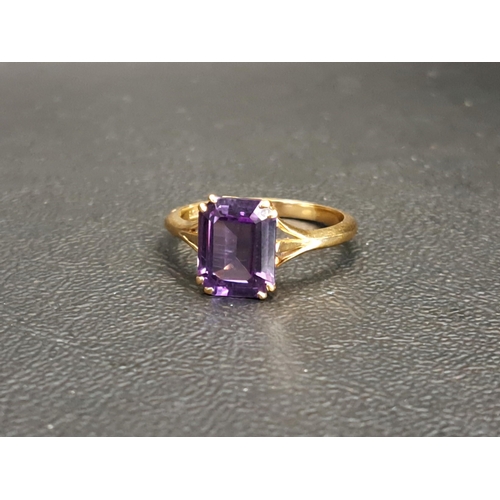 GEM SET SINGLE STONE RING
the emerald cut gemstone with colour change properties of green/blue and purple, on nine carat gold shank, ring size P and approximately 2.9 grams