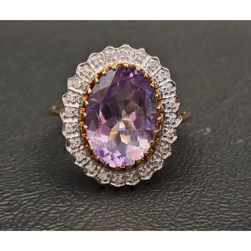 AMETHYST AND DIAMOND CLUSTER RING
the central oval cut amethyst measuring approximately 14.1mm x 10.1cm x 5.9mm, the diamond surround totalling approximately 0.12cts, on nine carat gold shank, ring size P