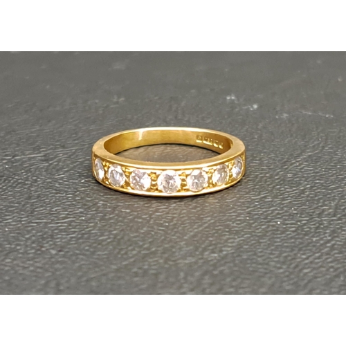 DIAMOND SEVEN STONE RING
the round brilliant cut diamond totalling approximately 0.65cts, in eighteen carat gold, ring size L-M and approximately 3.9 grams