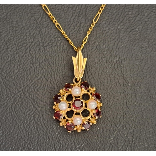 GARNET AND SEED PEARL CLUSTER PENDANT 
in nine carat gold and on nine carat gold chain, the pendant 1.6cm wide, total weight approximately 4.6 grams
