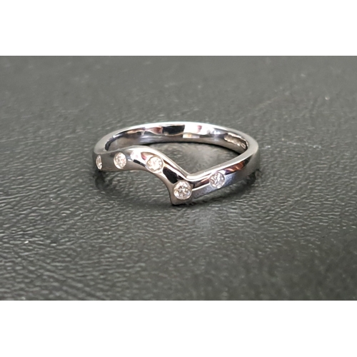 DIAMOND SET EIGHTEEN CARAT WHITE GOLD BAND
of shaped design, the five flush set diamonds totalling approximately 0.15cts, ring size N and approximately 3.3 grams