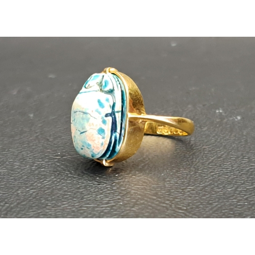 SCARAB RING
the turquoise glazed scarab on eighteen carat gold shank, Glasgow hallmarks for 1936, ring size I-J