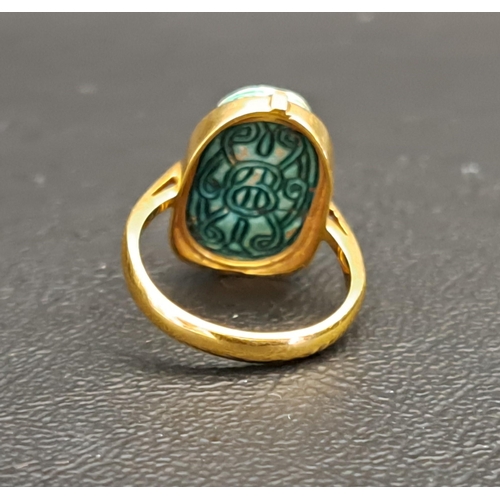 98 - SCARAB RING
the turquoise glazed scarab on eighteen carat gold shank, Glasgow hallmarks for 1936, ri... 