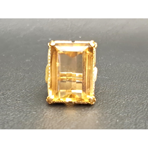 112 - CITRINE DRESS RING
the rectangular step cut citrine measuring approximately 19.6mm x 14.5mm x 8.2mm,... 