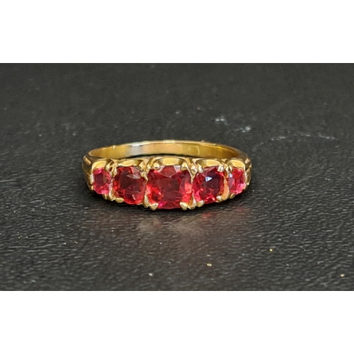 GRADUATED RUBY FIVE STONE RING
the cushion cut gemstones ranging from approximately 0.5cts in the centre to 0.15 at the sides, on gold shank (rubbed marks but tests as eighteen carat gold), ring size N-O