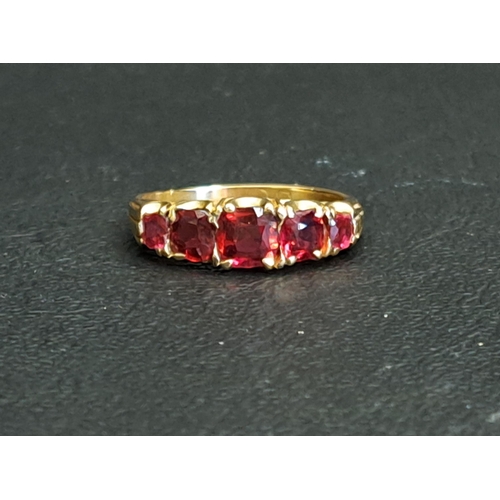 38 - GRADUATED RUBY FIVE STONE RING
the cushion cut gemstones ranging from approximately 0.5cts in the ce... 