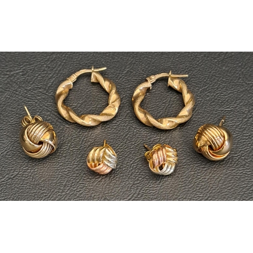 THREE PAIRS OF NINE CARAT GOLD EARRINGS
comprising two pairs of knot design studs and one pair of twisted hoops, total weight approximately 4.9 grams