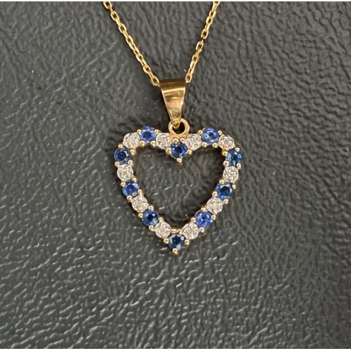 SAPPHIRE AND DIAMOND HEART SHAPED PENDANT 
in nine carat gold and on nine carat gold chain, approximately 2.1 grams