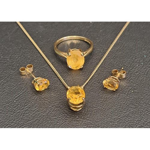 CITRINE SUITE OF JEWELLERY
comprising a single stone ring on nine carat gold shank, the oval cut citrine approximately 2.2cts, ring size O; a pair of stud earrings in unmarked gold; and a single stone pendant in fourteen carat gold and on nine carat gold chain, total weight approximately 6.9 grams