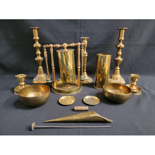 MIXED LOT OF BRASSWARE
including a trench art table gong, pair of large ejector candlesticks, pocket lighter, pair of bowls, pair of trinket dishes, squat pair of candlesticks and other items