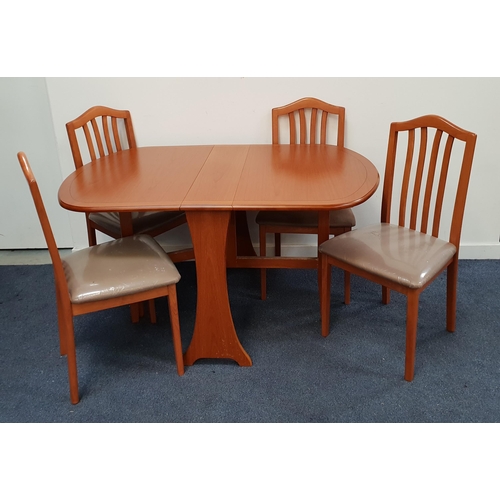 TEAK DROP FLAP TABLE AND FOUR CHAIRS
the table with shaped flaps and gate leg action, 73.5cm high, together with four Morris Furniture Company shaped back chairs with stuffover seats