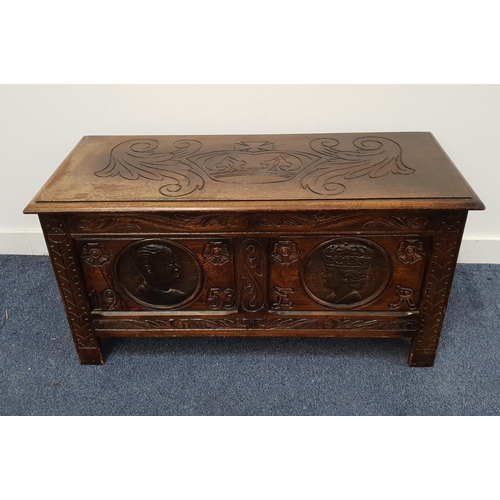 COMMEMORATIVE CARVED OAK COFFER
to celebrate the crowning of Queen Elizabeth II, with a lift up lid depicting a crown above a panelled front with the carved profiles of Queen Elizabeth II and the Duke of Edinburgh and 1953 E.R., the interior with a makers plaque for L. Marcus Ltd, 48.5cm x 96cm x 42.5cm