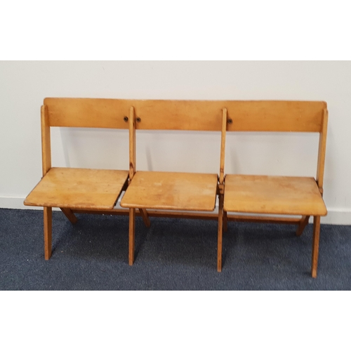 MID 20th CENTURY SET OF BEECH FOLDING BENCH SEATS
the three individual conjoined seats on a folding frame, 77.5cm x 139.5cm