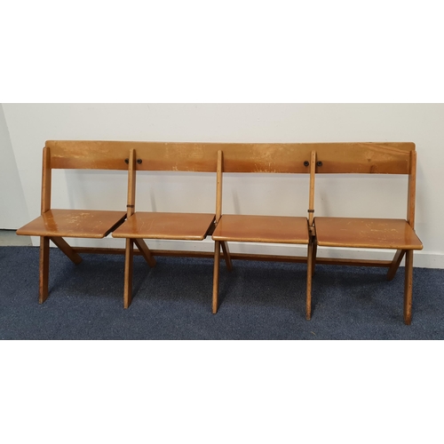 MID 20th CENTURY SET OF BEECH FOLDING BENCH SEATS
the four individual conjoined seats on a folding frame, 77.5cm x 185cm