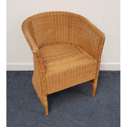 WICKER CONSERVATORY ARMCHAIR
with a horseshoe back, standing on turned supports
