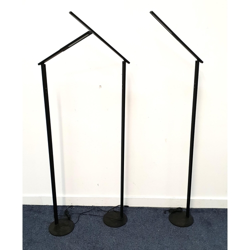 THREE FABAS LUCE SPA FLOOR STANDING LAMPS
raised on a circular steel feet with black anodised aluminium bodies with folding arms, 131cm high to arm (3)
