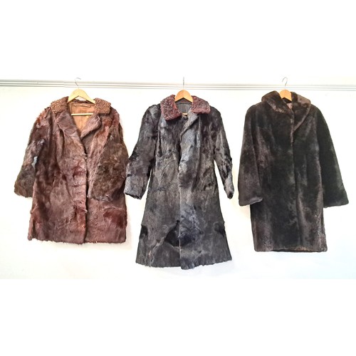 LADIES VINTAGE BROWN MINK COAT
with a retailers label for 'B. Armstrong, 277 Dumbarton Road, Glasgow', with two pockets; a black mink coat with an internal pocket and two external pockets; and a brown faux fur jacket (3)