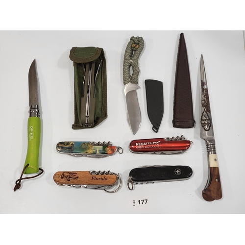 SELECTION OF KNIVES AND MULTITOOLS
comprising four swiss army knives one branded Regatta. two knives with sheaths, a knife and fork multi tool and an Opinel No.7 folding knife (8)